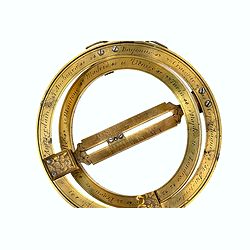 A Michael Butterfield brass universal equinoctial ring dail.